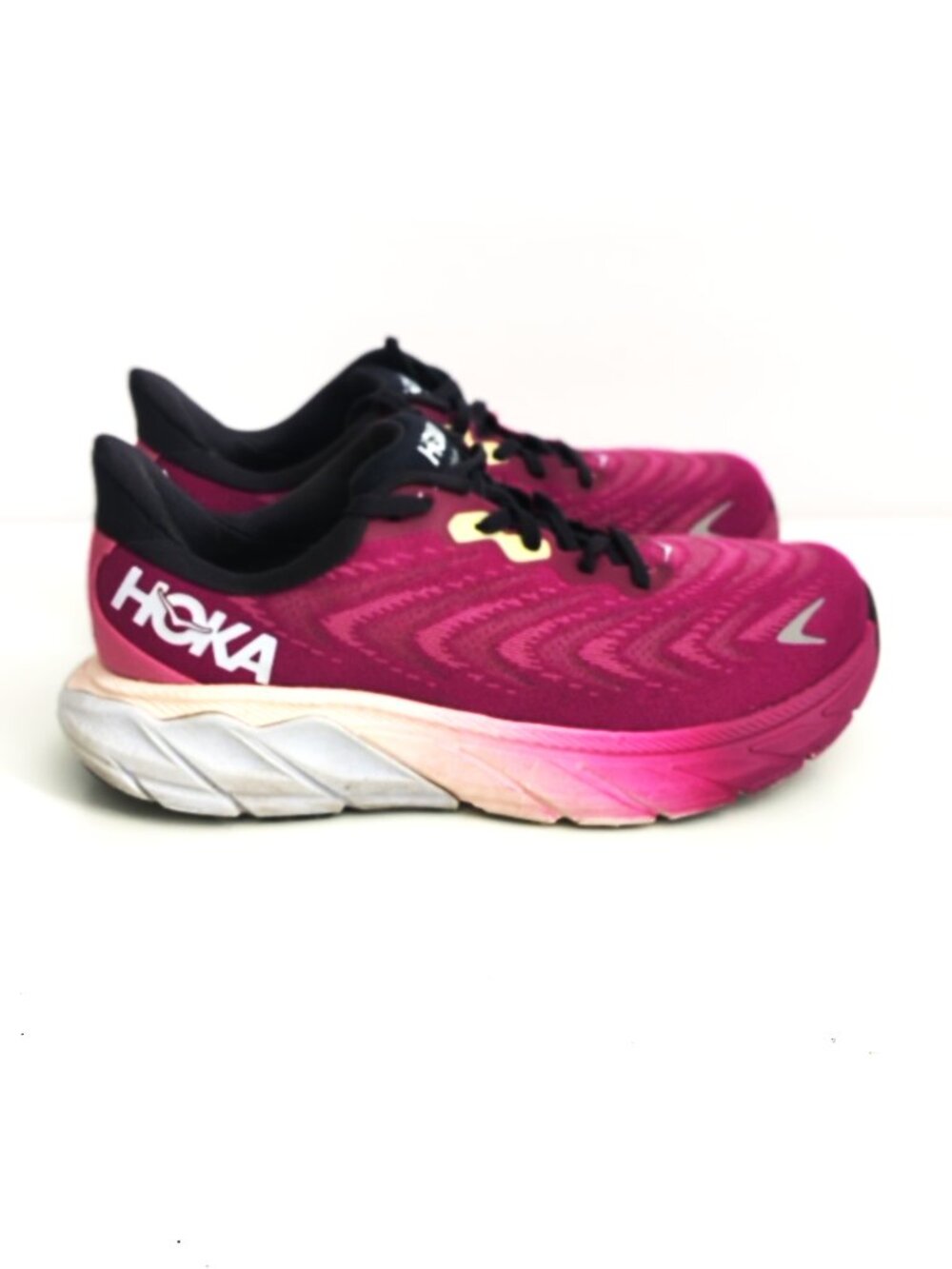 HOKA Arahi 6 stability running shoe in a vibrant purple and pink c